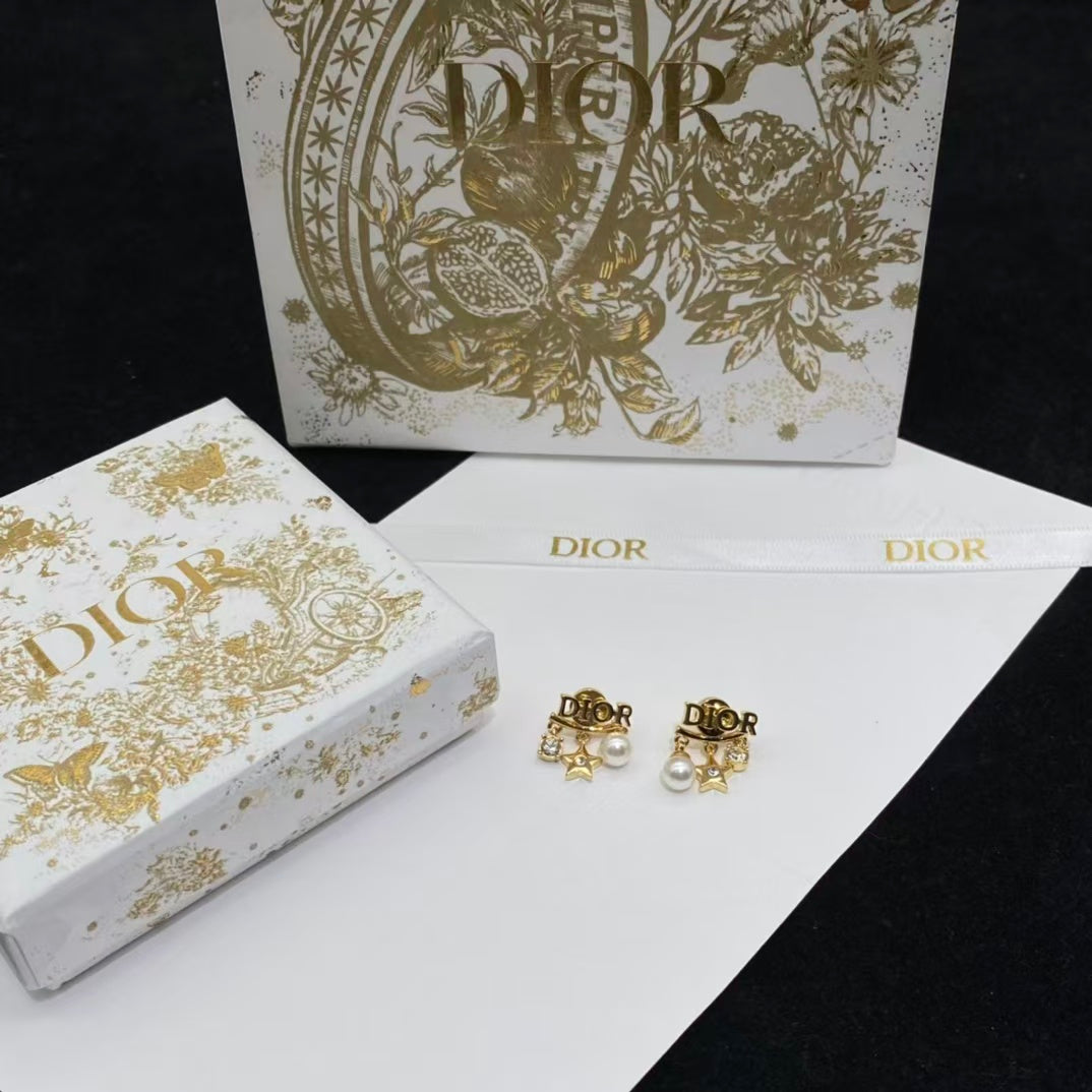 CD DioRevolution Earrings Gold-Finish Metal