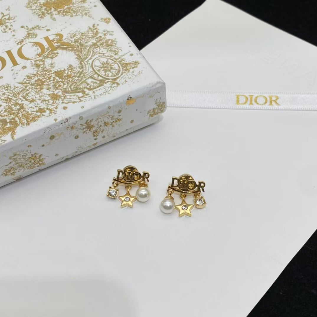 CD DioRevolution Earrings Gold-Finish Metal