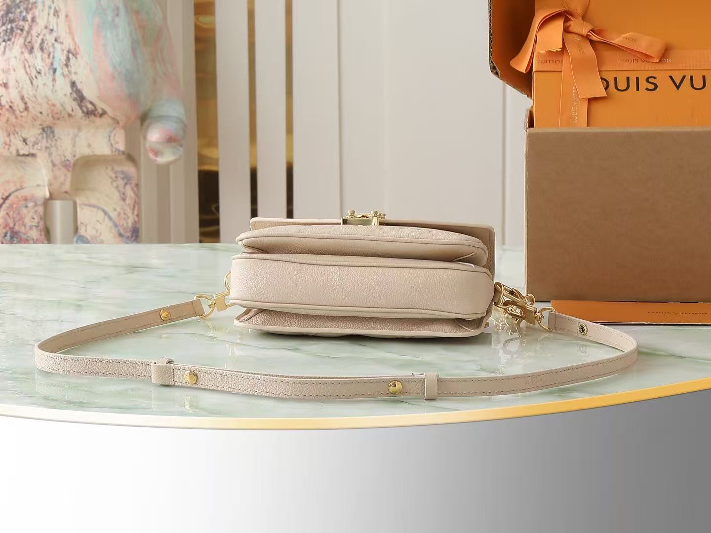 Louis Vuitton 2025 Pochette Métis East West Bag Beige Monogram Empreinte Leather