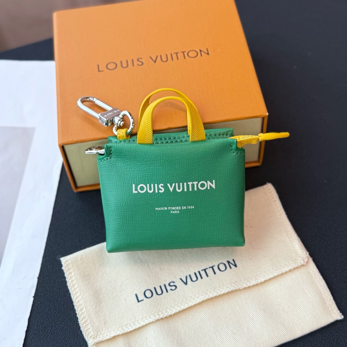 LV Shopping Bag Charm Leather