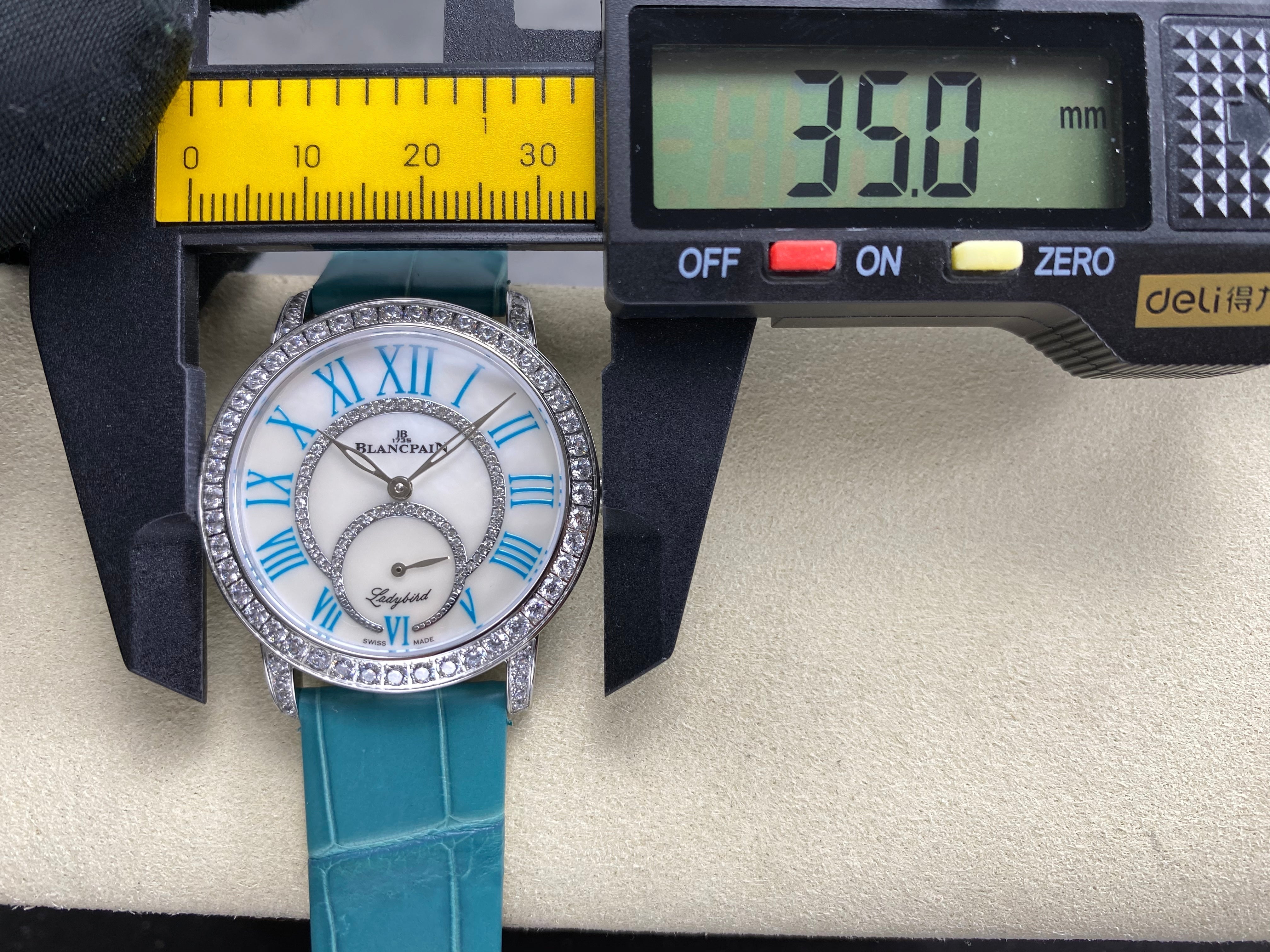 Blancpain's Ladybird 35mm White Blue Dial Diamond Bezel Leather