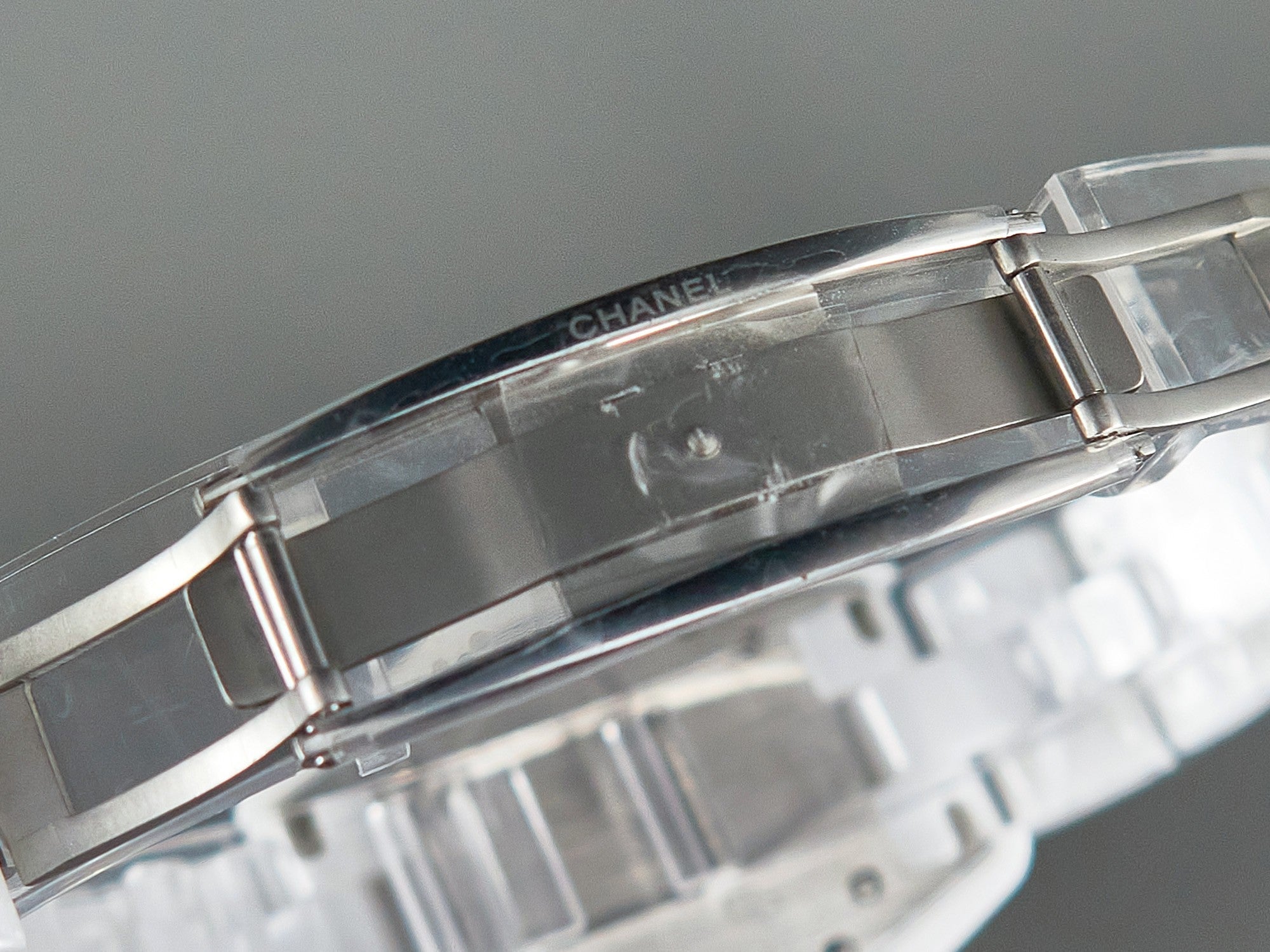 J12 Date Quartz White Ceramic Blue Numerals White Dial