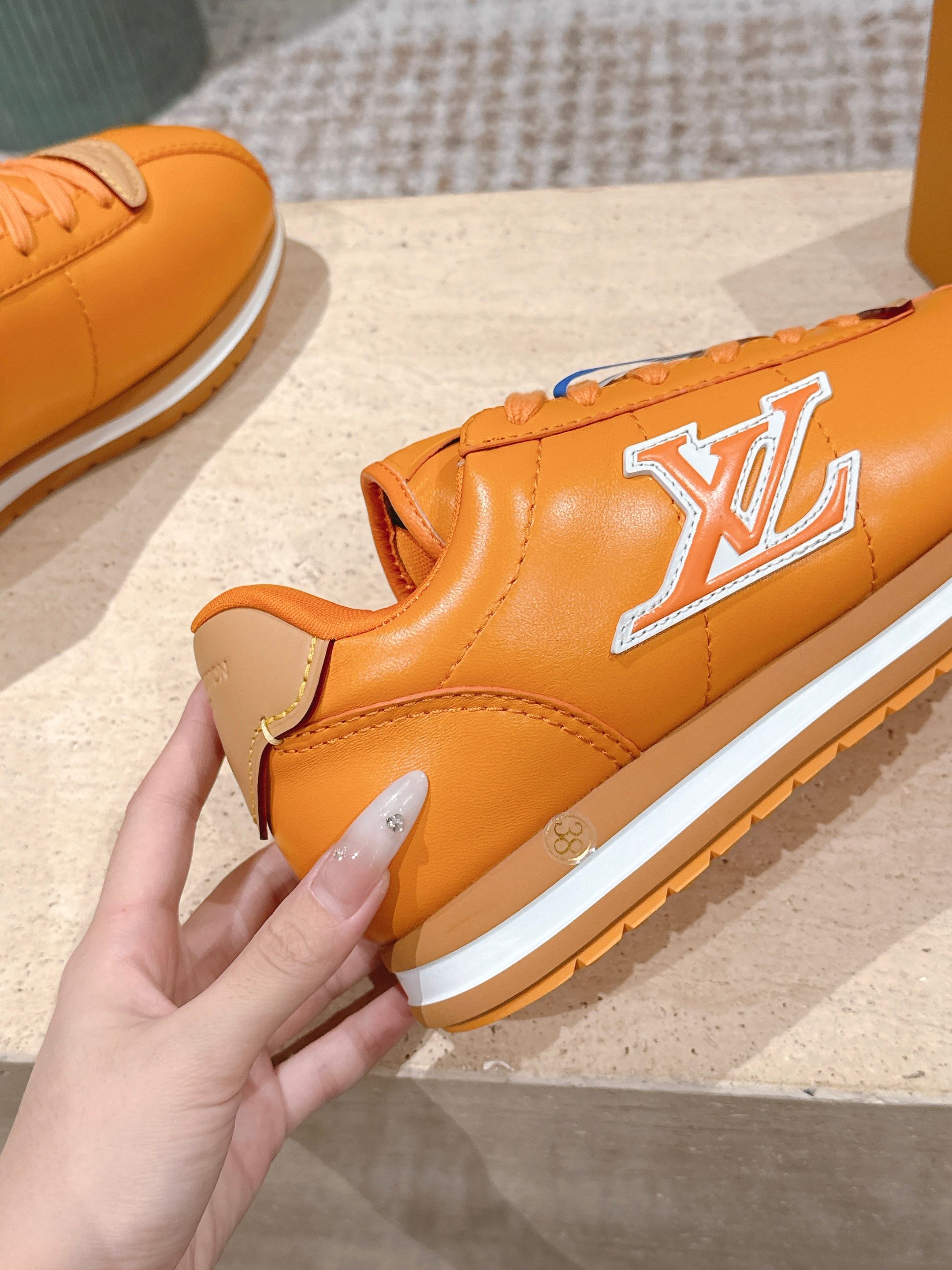 LV 25 Buttersoft Sneakers Orange Calfskin 576994