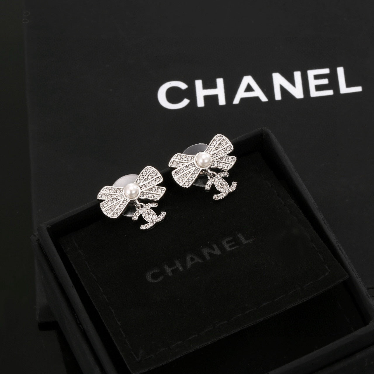 CC Double C Bow Sliver Diamond Pearl Earrings