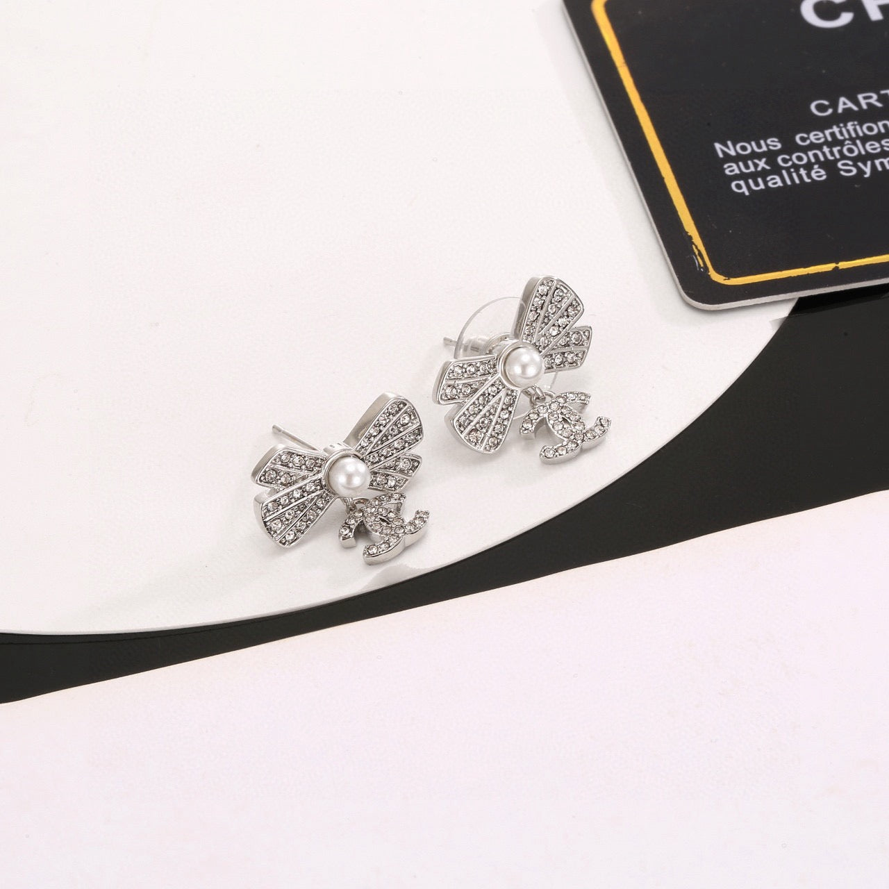 CC Double C Bow Sliver Diamond Pearl Earrings