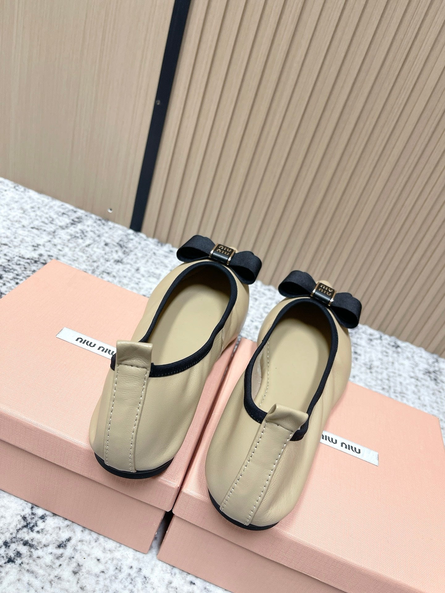 Miu Pointed-Toe Ballet Flats Beige Black Sheepskin 591562