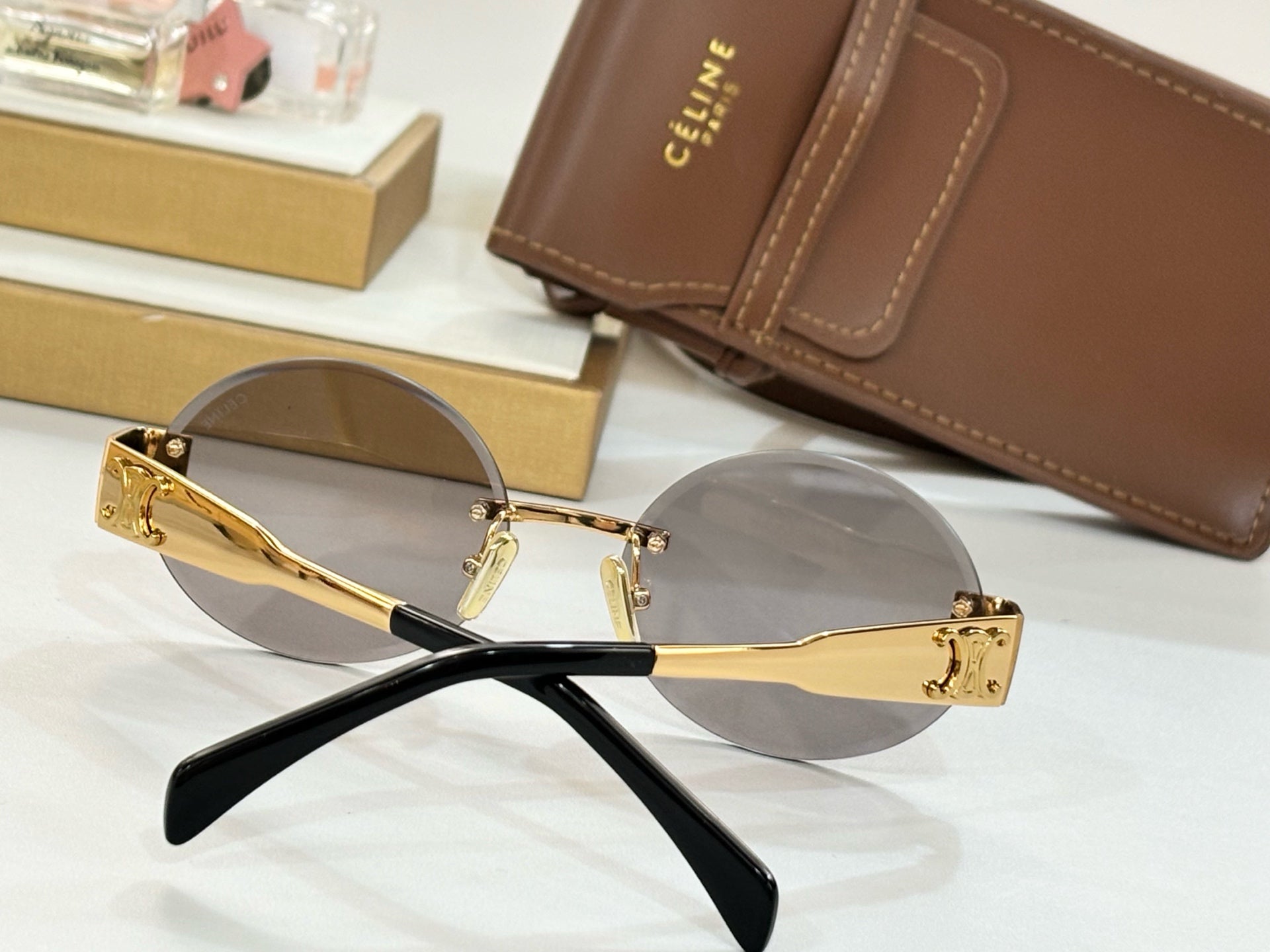TRIOMPHE SUNGLASS CL42121U IN METAL