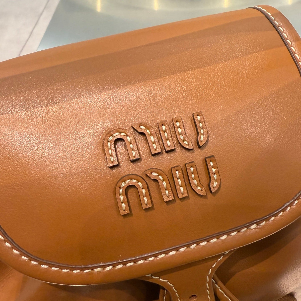 MiuMiu 2026 Buckle Gold Backpack Leather