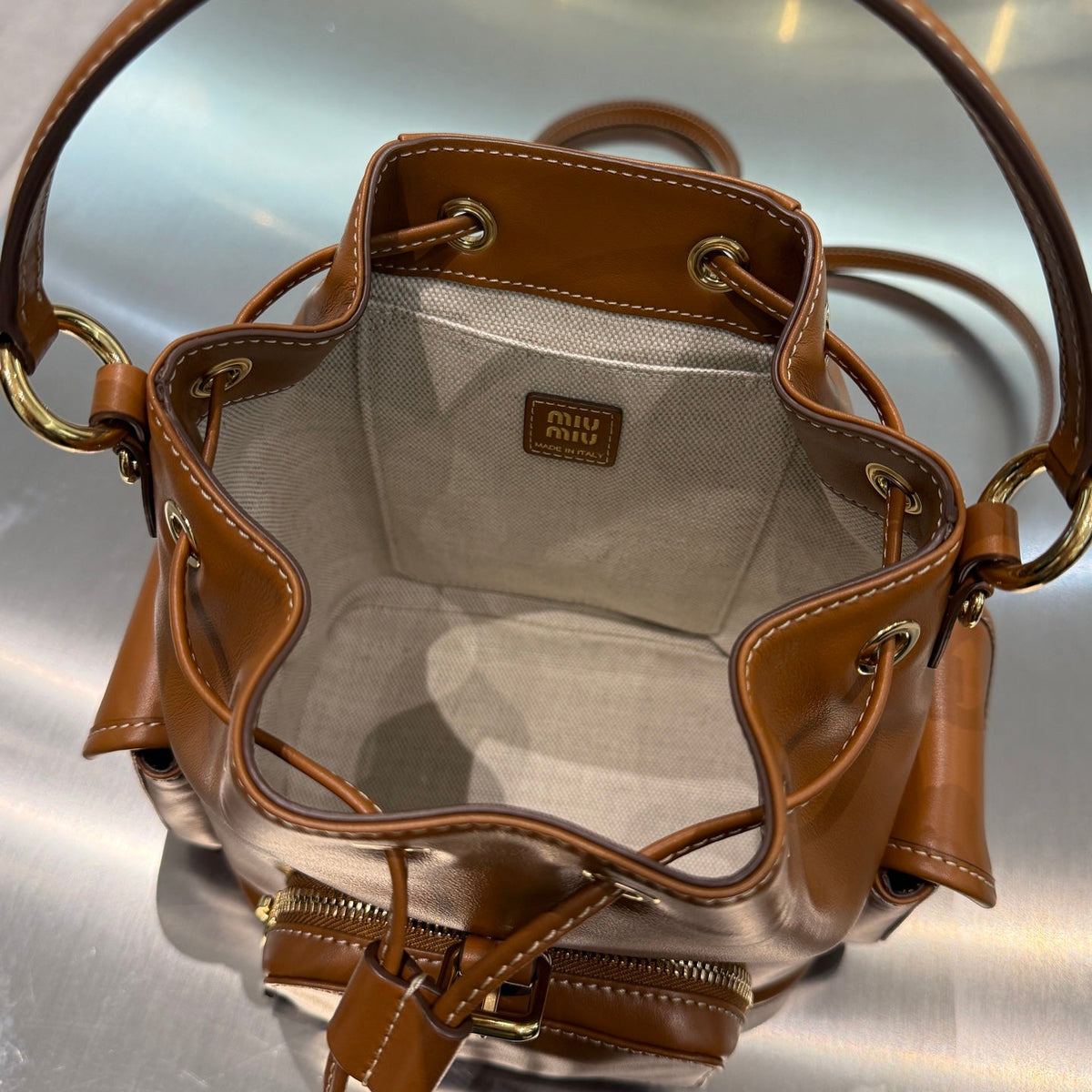 MiuMiu 2026 Buckle Gold Backpack Leather