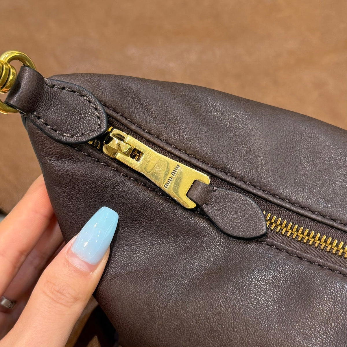 MiuMiu 2026 Spirit Pouch Bag 19cm Dark Brown Nappa Leather