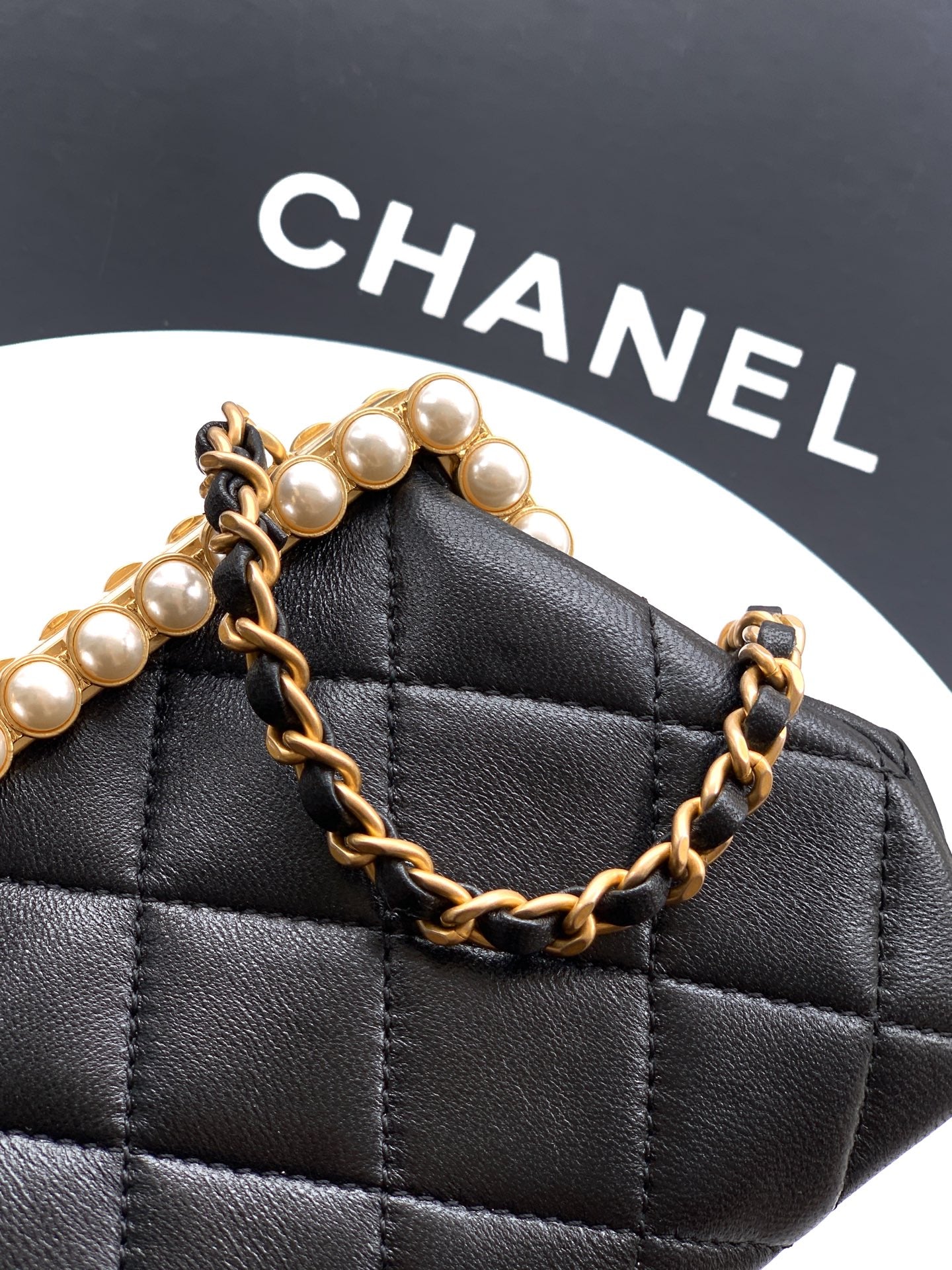Chanel 2026 Pearl Clutch Black Gold Lambskin 321877