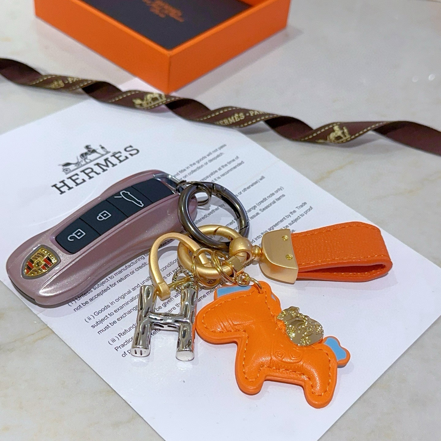 HM Rodeo Pegase Bag Charm Orange Lambskin