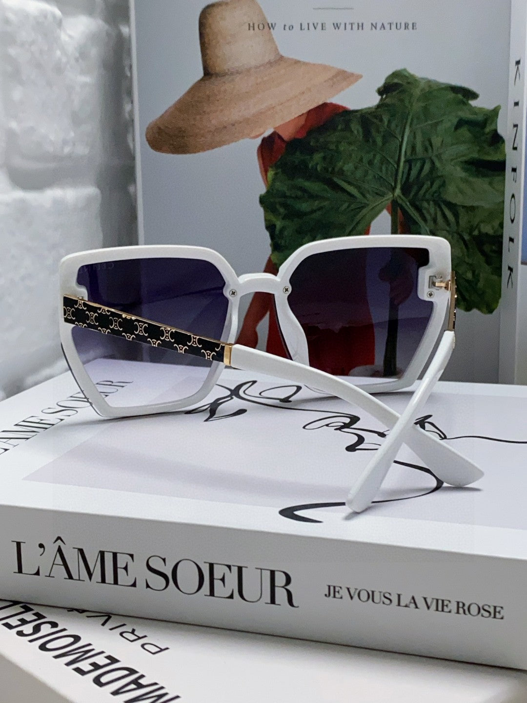 TRIOMPHE SUNGLASS 497829 IN WHITE ACETATE EMBOSSED LOGO