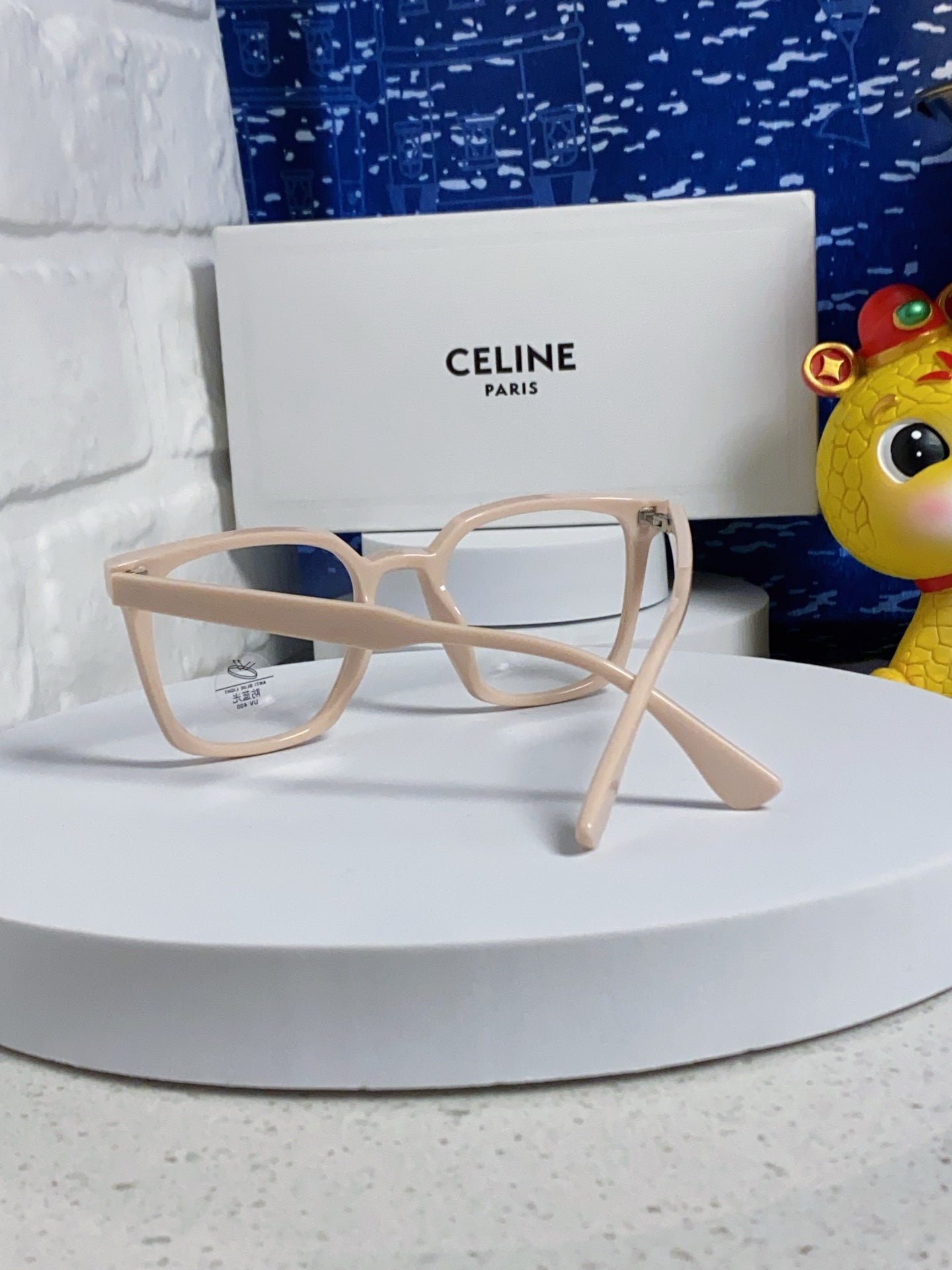 TRIOMPHE SUNGLASSES 563252 IN NUDE ACETATE