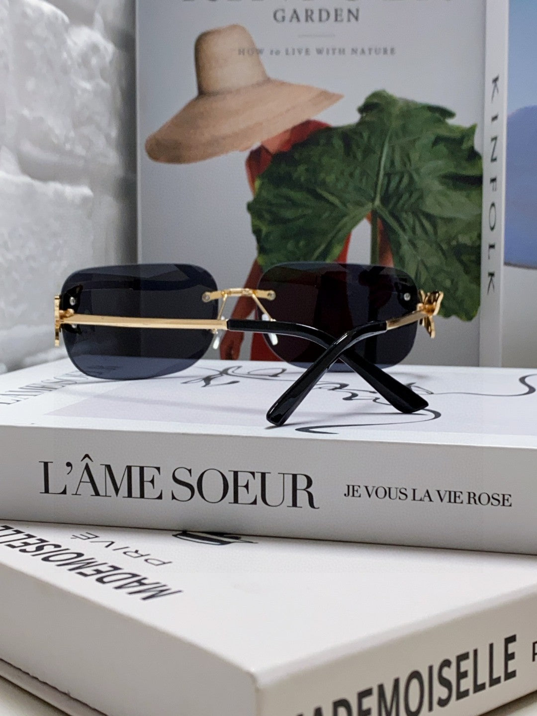 BUTTERFLY EMBELLISHED RIMLESS RECTANGULAR FRAME SUNGLASSES 570245 IN METAL